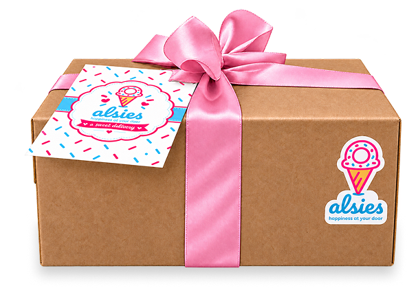 An Alsies PopBox tied with a ribbon